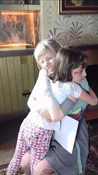 Aurora Aksnes hug child